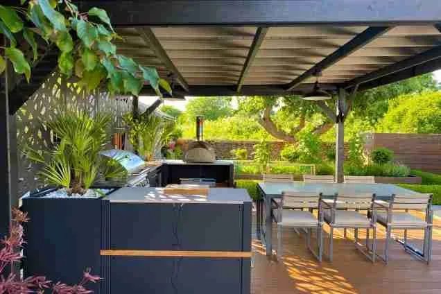 roofed outdoor kitchen with pizza oven and Bull gas BBQ in Sherston, Malmesbury