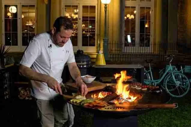 tristan welch cooking on chefs anvil in the evening