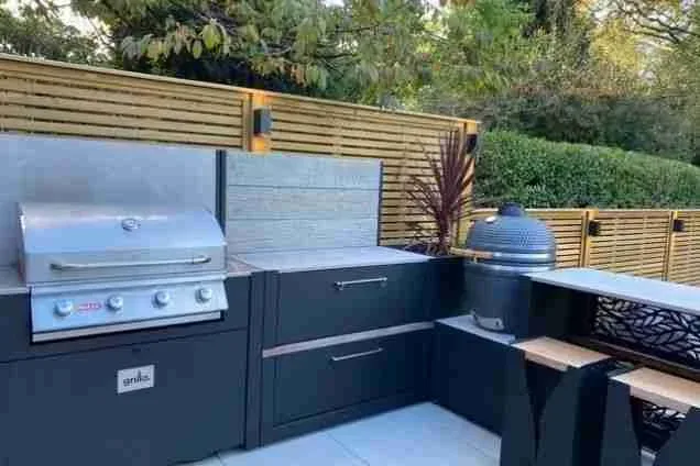 outdoor kitchen with Bull gas BBQ and Gusto Charcoal BBQ at Stockport, Cheshire