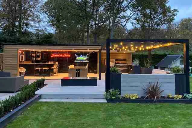 Outdoor kitchen in Berkhamsted, Hertfordshire under garden room awning