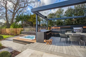 Outdoor kitchen in Stoke D'Abernon, Cobham garden with hot tub and dog