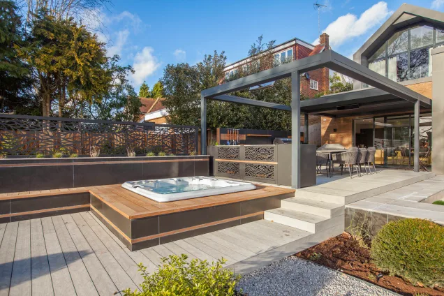 Outdoor kitchen in Stoke D'Abernon, Cobham garden with tub