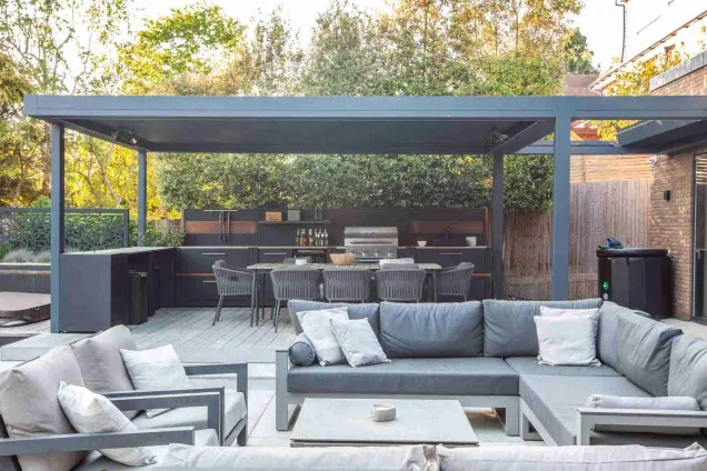Outdoor kitchen in Stoke D'Abernon, Cobham garden under pergola with outdoor seating