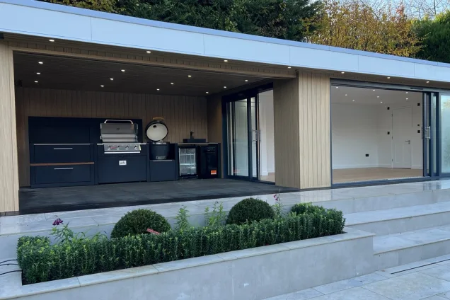 outdoor kitchen under garden building roof in Sevenoaks, Kent