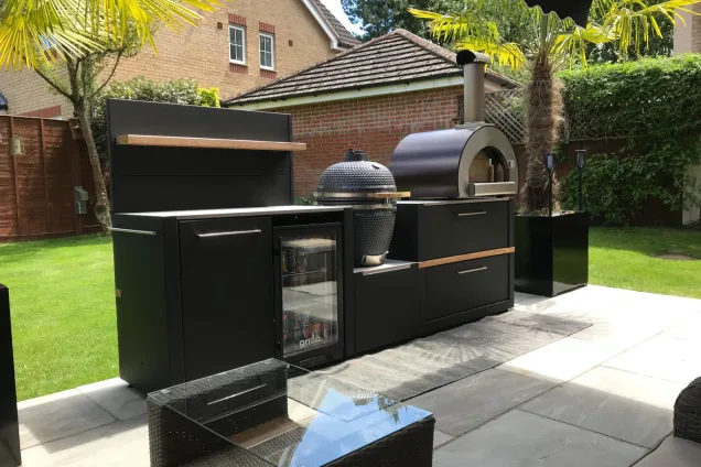 Outdoor kitchen in Braintree, Essex with outdoor fridge and bin
