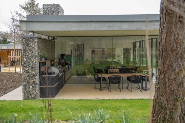 Grillo outdoor kitchen on Grand Designs with outdoor dining table and chairs