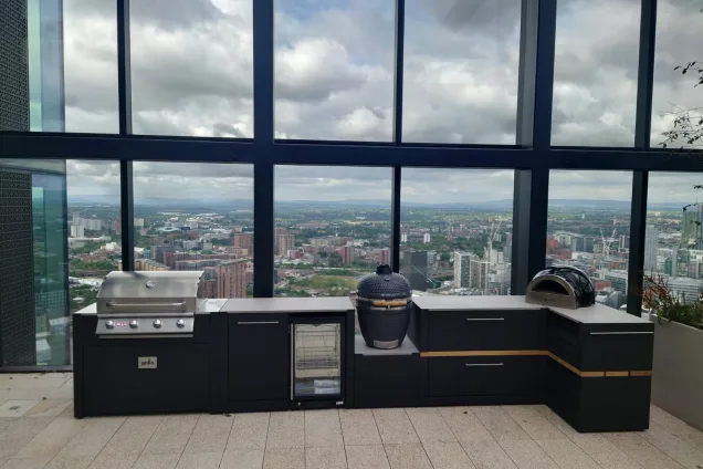 Outdoor kitchen in Manchester with pizza oven, gas and charcoal bbqs