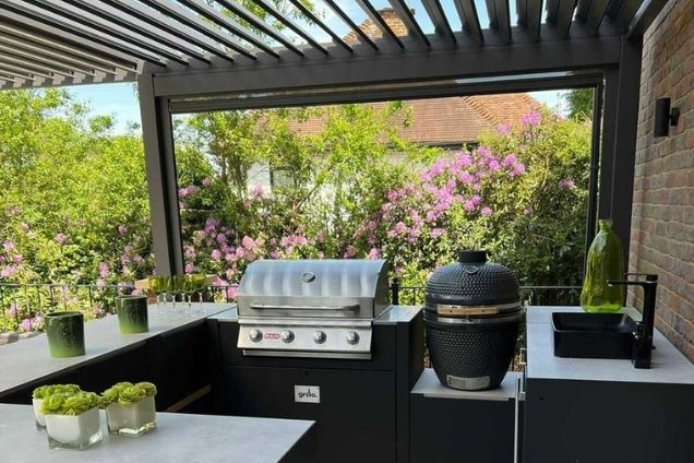 Outdoor kitchen in Tadworth with bull gas bbq and gusto bbq under pergola