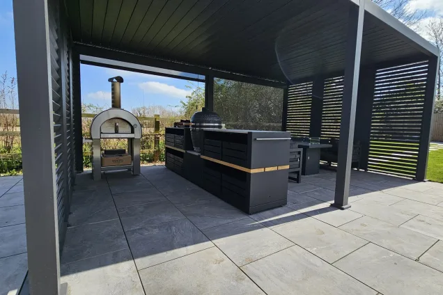 Outdoor Kitchen in Hathern with seating area on patio under pergola