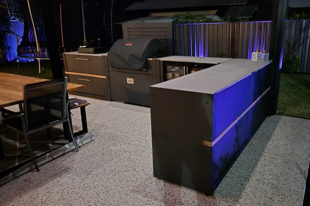 Bull Gas Grill with cover in outdoor kitchen at night in Gwelup, Perth, WA
