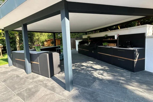 Outdoor kitchen under pergola in Farnham with bull gas bbq and storage units