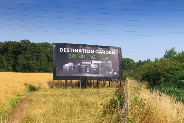 Grillo kitchen billboard saying Destination garden boarding now