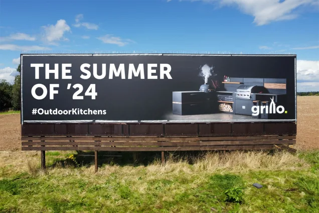 Grillo kitchen billboard saying the summer of '24
