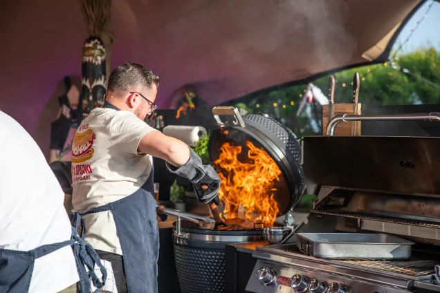 sorted food chef with fire coming out of the grillo gusto