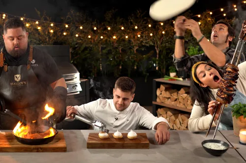 four chefs cooking in the grillo filming studio
