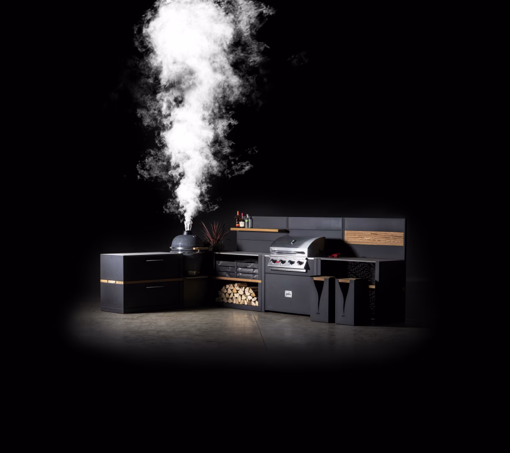 outdoor kitchen in studio with smoke coming out gusto charcoal bbq