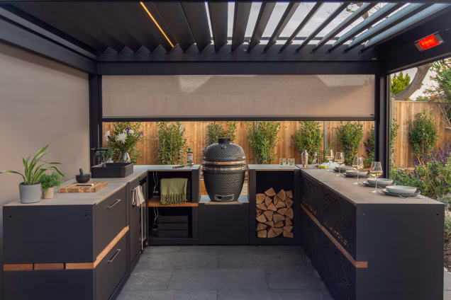 A Grillo outdoor kitchen under a Grillo pergola