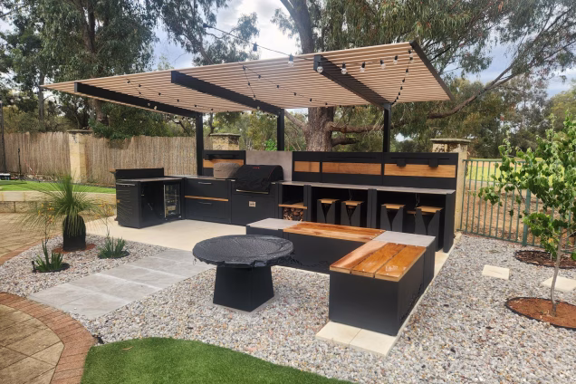 grillo outdoor kitchen under canopy with seating and bbq