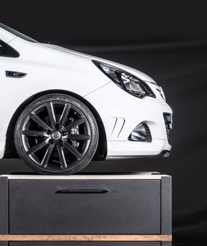 Closeup photo of a Corsa VXR Nürburgring Edition parked on some unmodified Grillo Vantage kitchen cabinetry