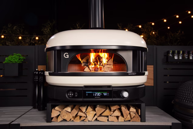 wide shot of dome gen 2 pizza oven on base on grillo worktop