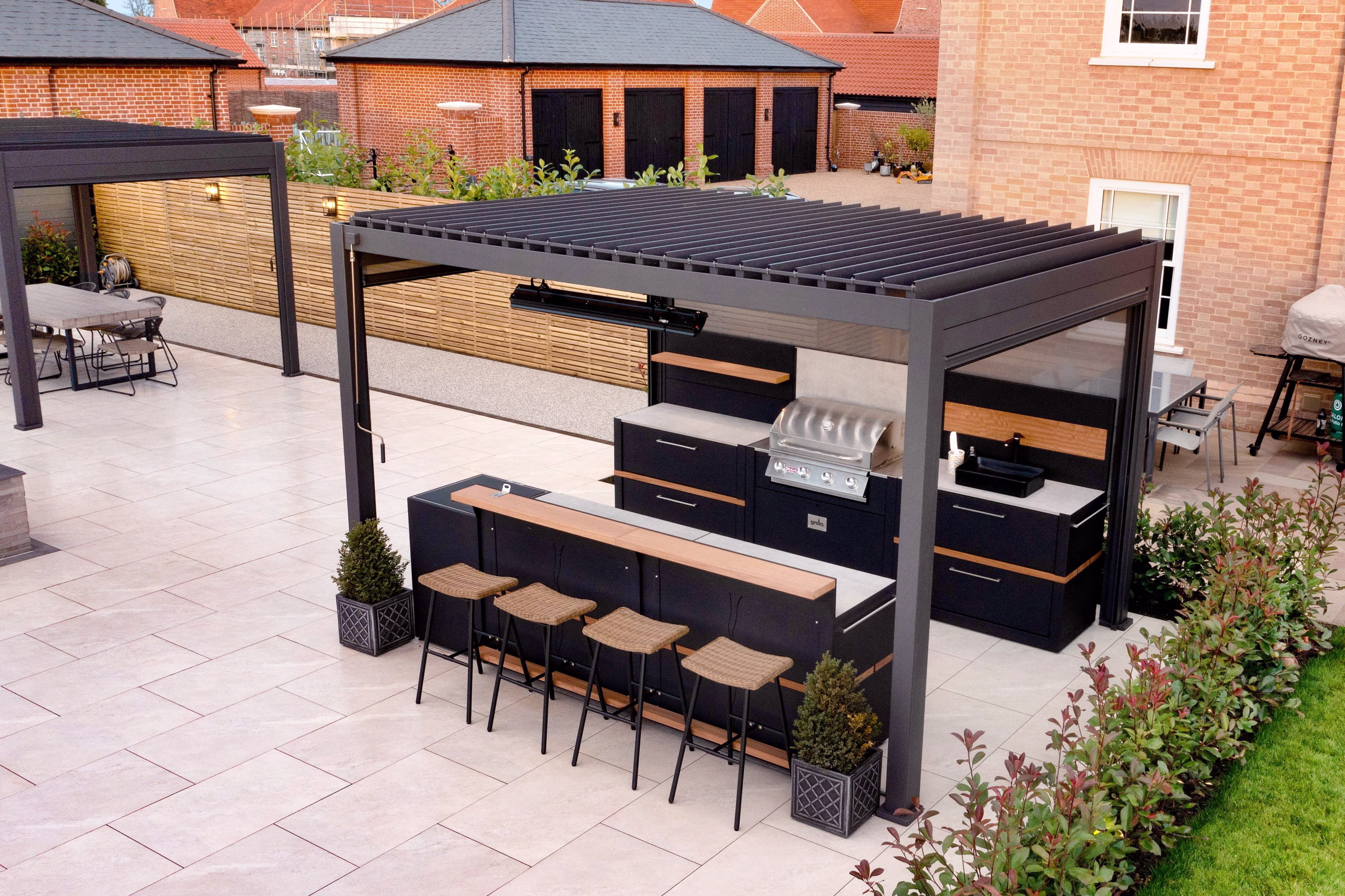 A drone view of the outdoor kitchen in a garden at Horkesley Heath, near Colchester