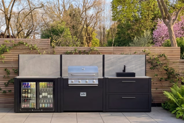 element outdoor kitchen with double drinks fridge, bull gas grill station, and storage unit with sink